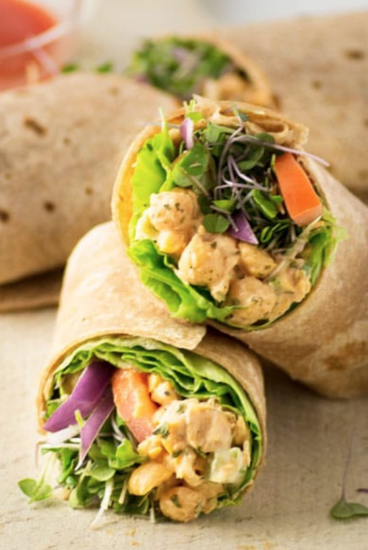 <p>Mindful Avocado</p><p>Buffalo chickpea salad paired with veggies and rolled into a wrap equals the best lunch! This chickpea salad is the ultimate vegan sandwich filler!</p><p><strong>Get the recipe: <a href="https://mindfulavocado.com/buffalo-chickpea-wraps/" rel="nofollow noopener" target="_blank" data-ylk="slk:Buffalo Chickpea Wraps;elm:context_link;itc:0;sec:content-canvas" class="link rapid-noclick-resp"><em>Buffalo Chickpea Wraps</em></a></strong></p>