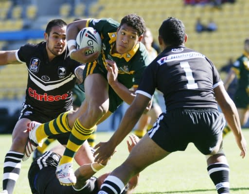 Israel Folau on the charge while playing rugby league for Australia against New Zealand