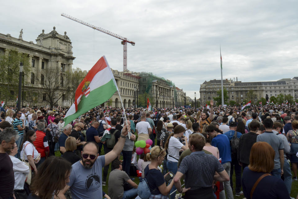 People gather in support of a political newcomer Peter Magyar, a former insider within Hungary's ruling Fidesz party on Saturday, April 6, 2024. A rising challenger to Hungarian Prime Minister Viktor Orbán mobilized tens of thousands of supporters outlining a plan to unite the country and bring an end to the populist leader's 14-year hold on power. (AP Photo/Justin Spike)