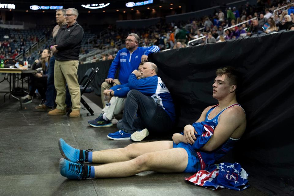 Owen Valley’s Eli Hinshaw reflects after falling in the quarterfinal round of the 2023 IHSAA Semistate Wrestling tournament at Ford Center in Evansville, Ind., Saturday, Feb. 11, 2023. 