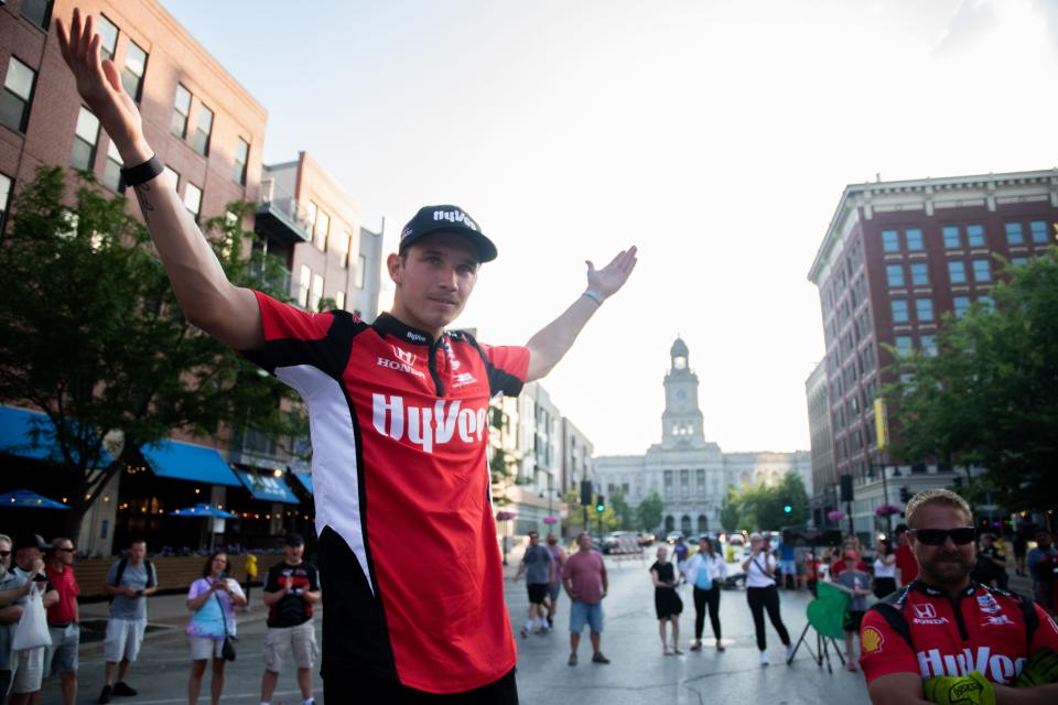 IndyCar driver Christian Lundgaard fires up the crowd before a pit stop demonstration this summer in downtown Des Moines.