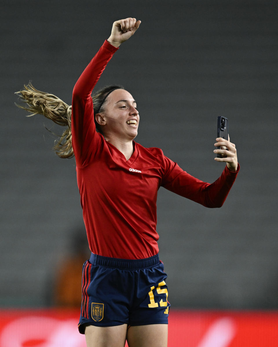 Spain's Eva Navarro takes a selfie as she celebrates after defeating Sweden in the Women's World Cup semifinal soccer match between Sweden and Spain at Eden Park in Auckland, New Zealand, Tuesday, Aug. 15, 2023. (AP Photo/Andrew Cornaga)