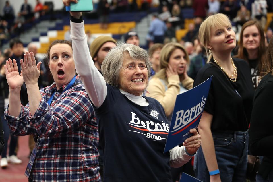 Bernie Sanders' supporters watch early results at a primary night event Feb. 11 in Manchester, N.H.