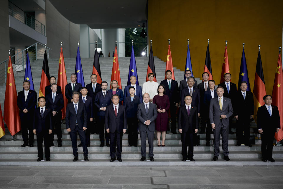 German Chancellor Olaf Scholz, front row center, and Chinese Premier Li Qiang, center left, pose with government members during consultations of the both countries at the chancellery in Berlin, Germany, Tuesday, June 20, 2023. (AP Photo/Markus Schreiber)