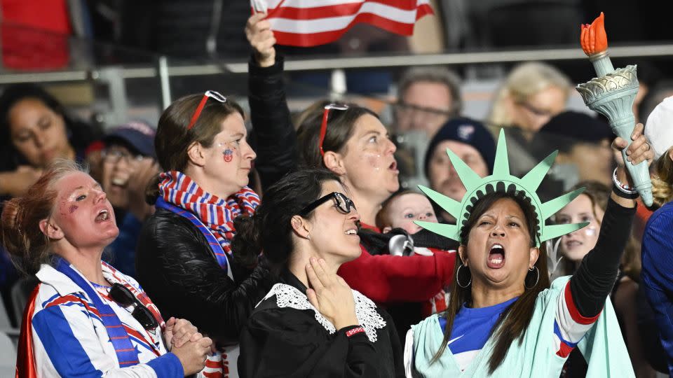 Fans of the US team get ready for the Women's World Cup group game against Portugal. - Andrew Cornaga/AP