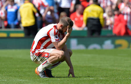 Soccer Football - Premier League - Stoke City vs Crystal Palace - bet365 Stadium, Stoke-on-Trent, Britain - May 5, 2018 Stoke City's Erik Pieters looks dejected after the match as they are relegated from the Premier League. REUTERS/Peter Powell