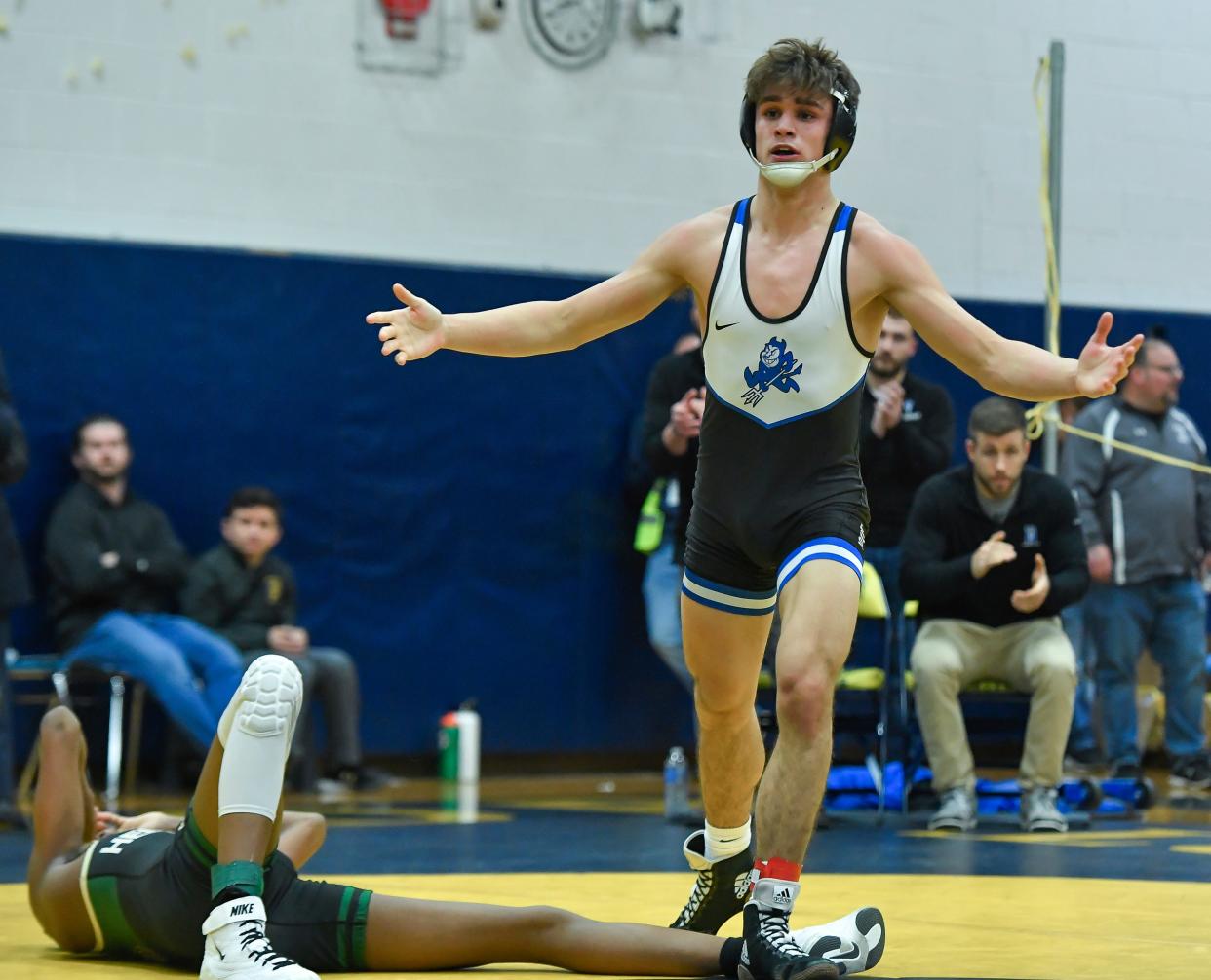 Brockport's Dino Battisti, right, reacts after beating Rush-Henrietta's Fletcher Smith in the final of the 145-pound weight class during the Teike-Bernabi Wrestling Tournament, Friday, Dec. 29, 2023.