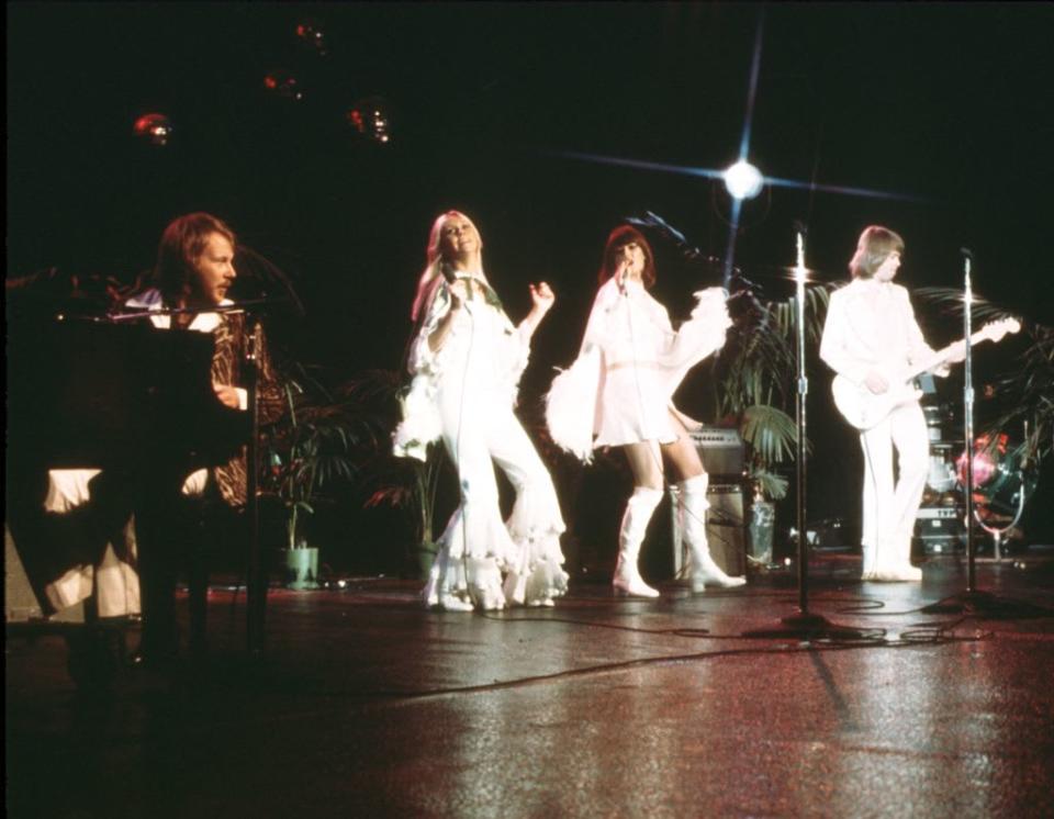 Abba wearing all white