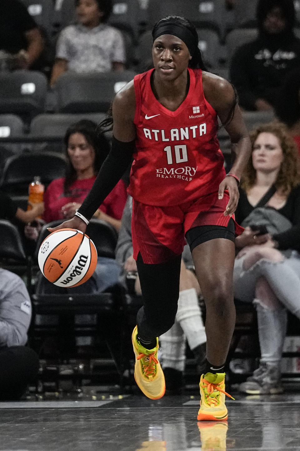 Atlanta Dream guard Rhyne Howard (10) works against the Chicago Sky during a WNBA basketball game, Tuesday, May 30, 2023, in College Park, Ga. The Atlanta Dream's hopes for moving up in the WNBA rest heavily on second-year player Rhyne Howard, the 2022 No. 1 overall pick who did not disappoint as an All-Star and Rookie of the Year. (AP Photo/John Bazemore)