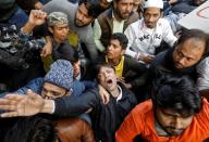 A demonstrator shouts slogans during a protest against a new citizenship law, in New Delhi