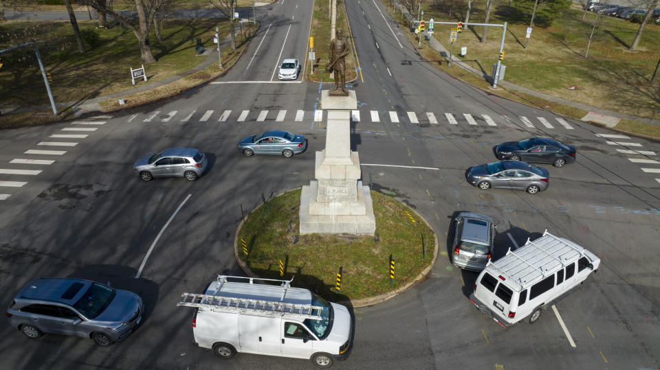 Traffic moves around the circle at the monument of Confederate Gen. A.P. Hill, which contains his remains. 