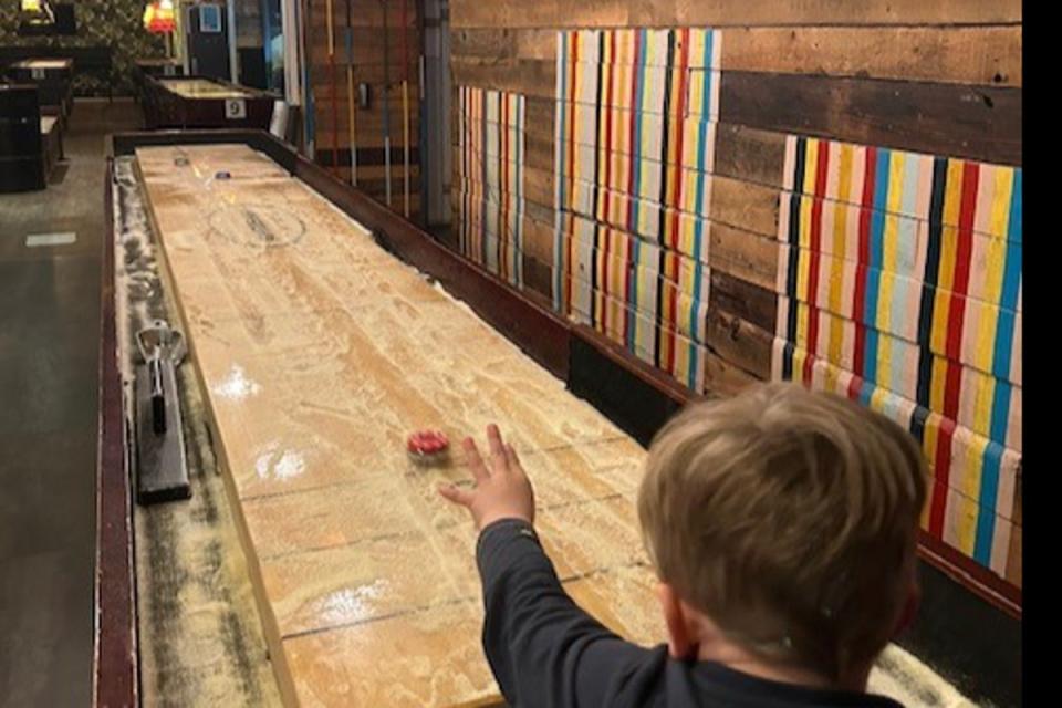 Shuffleboard at Generator’s Copenhagen hostel (Dom Tulett)