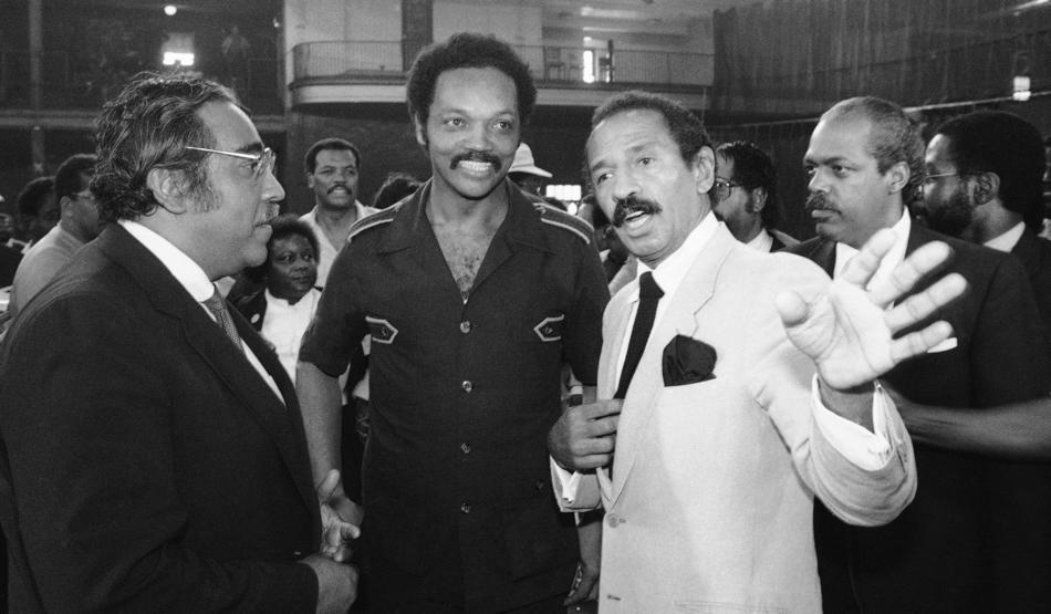 From right, Rep. John Conyers, the Rev Jesse Jackson and Rep. Charlie Rangel (D-N.Y.) confer at a congressional hearing on police brutality in September 1983. 