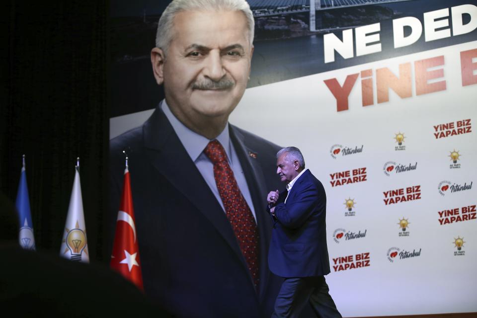 Binali Yildirim mayoral candidate for Istanbul prepares to make statements at Turkey's ruling Justice and Development Party, AKP, offices in Istanbul, Sunday, June 23, 2019. Polls have closed in Istanbul after voters cast ballots in a re-run mayoral election after a March 31 vote was voided for procedural irregularities. (AP Photo/Emrah Gurel)