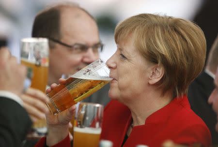 German Chancellor Angela Merkel attends the 500th anniversary ceremony of the German Beer Purity Law (Reinheitsgebot) in Ingolstadt, Germany, April 22, 2016. REUTERS/Michaela Rehle