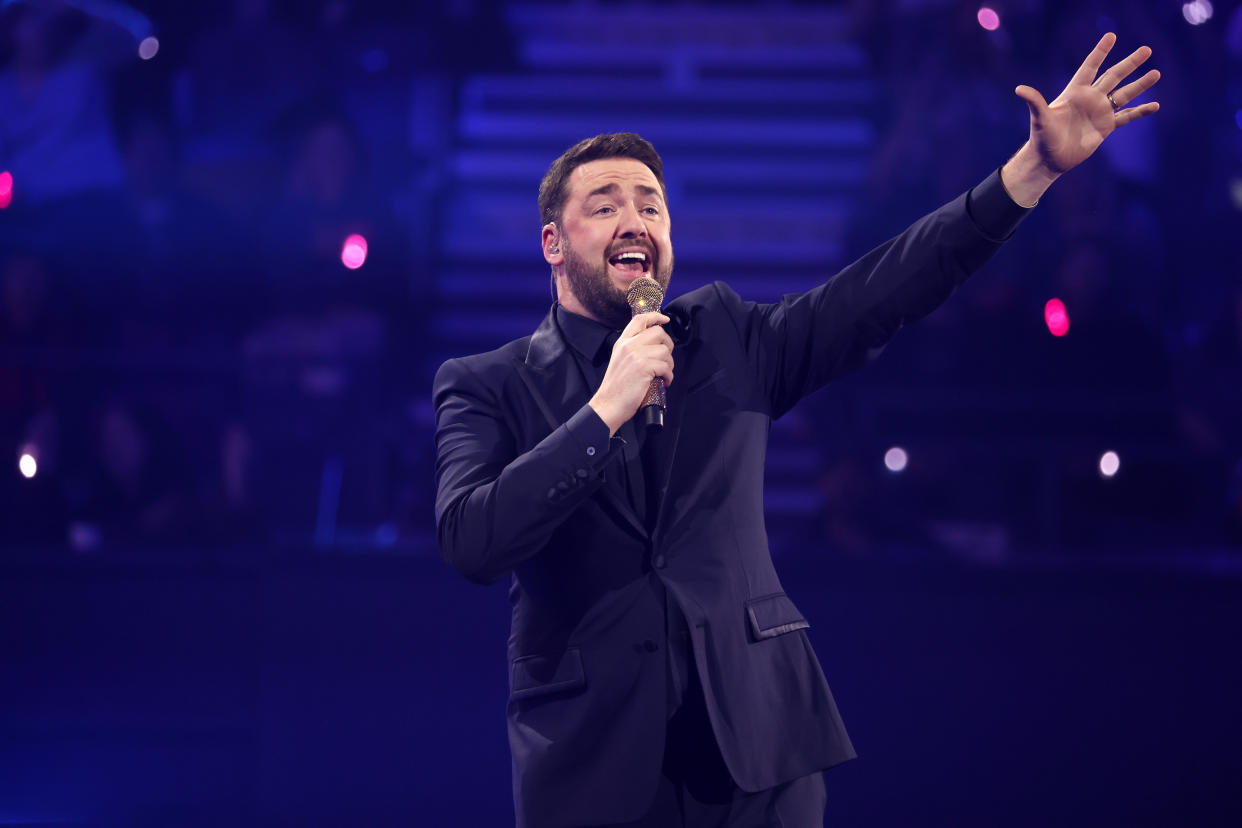 LONDON, ENGLAND - DECEMBER 06:  Jason Manford on stage at The National Lottery's Big Bash to celebrate 2022's entertainment packed year at OVO Arena Wembley on December 06, 2022 in London, England. Coming to ITV and ITVX on 31st December. (Photo by John Phillips/Getty Images for The National Lottery)