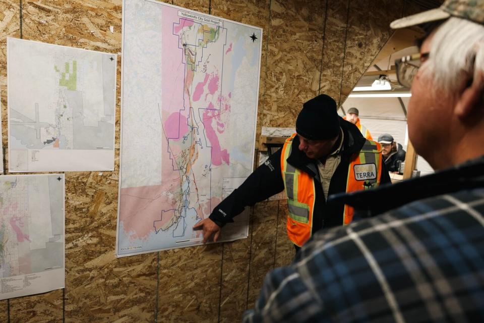 Panneton points to mining areas of interest on the Yellowknife City Gold Project map.