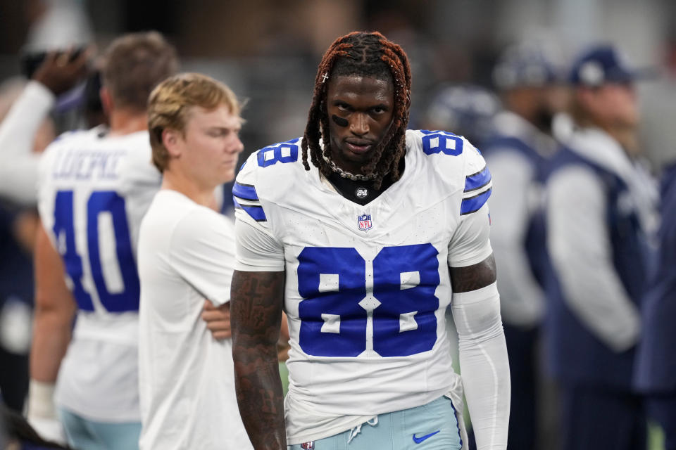 Dallas Cowboys wide receiver CeeDee Lamb walks on the team's sideline in the first half of an NFL football game against the Baltimore Ravens in Arlington, Texas, Sunday, Sept. 22, 2024. (AP Photo/Jeffrey McWhorter)