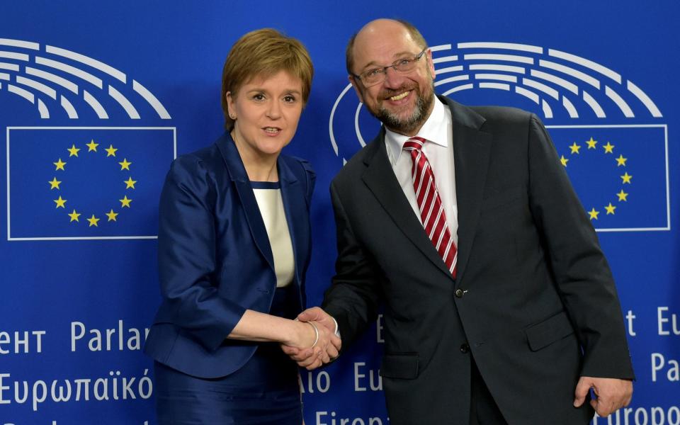 Scotland's First Minister Nicola Sturgeon is welcomed by European Parliament President Martin Schulz - Credit:  ERIC VIDAL