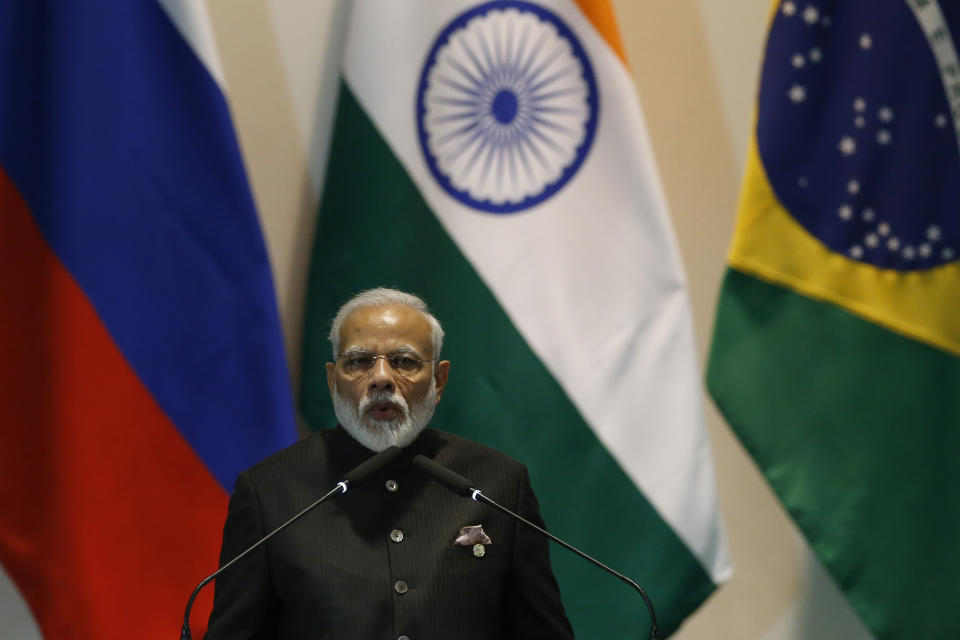 India's Prime Minister Narendra Modi speaks during the Leaders Dialogue with BRICS Business Council and the New Development Bank, at the Itamaraty Palace in Brasilia, Brazil, Thursday, Nov. 14, 2019. (AP Photo /Eraldo Peres)