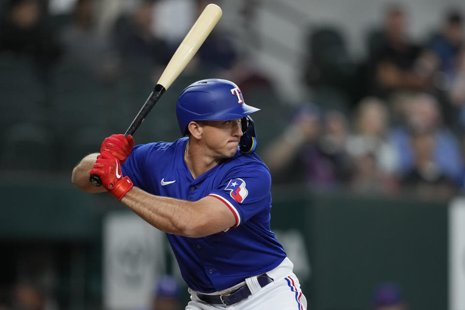 Texas Rangers' Wyatt Langford waits for a pitch during the second inning of a spring training baseball game against the Boston Red Sox, Monday, March 25, 2024, in Arlington, Texas. (AP Photo/Sam Hodde)