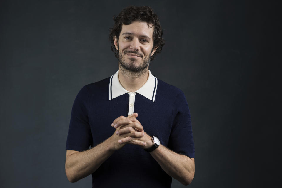 Adam Brody poses for a portrait to promote the film "Shazam! Fury of the Gods" at The London Hotel in West Hollywood, Calif., on Monday, Feb. 27, 2023. (Photo by Willy Sanjuan/Invision/AP)