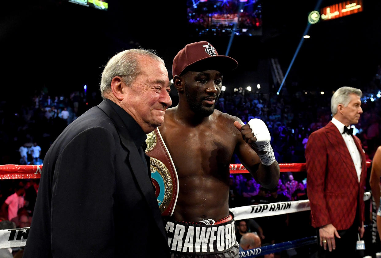 LAS VEGAS, NV - JUNE 09:  Terence Crawford celebrates his victory after a TKO in the 9th round with Top Rank boxing promoter Bob Arum after the WBO welterweight title between Jeff Horn and Terence Crawford at MGM Grand Garden Arena on June 9, 2018 in Las Vegas, Nevada.  (Photo by Bradley Kanaris/Getty Images)