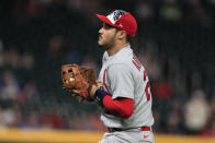 St. Louis Cardinals third baseman Nolan Arenado catches a pop fly for the out on Atlanta Braves' Ronald Acuna Jr. during the eighth inning of a baseball game Tuesday, July 5, 2022, in Atlanta. (AP Photo/Butch Dill)