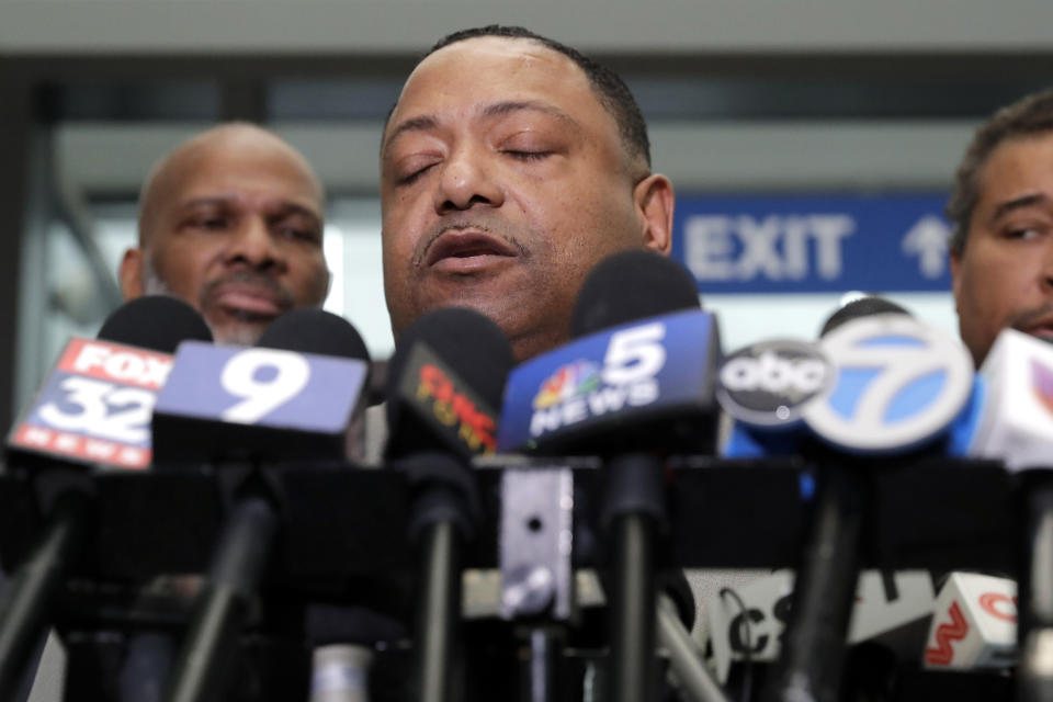 Rev. Marvin Hunter, Laquan McDonald's great-uncle, reacts as he speaks to reporters after a judge acquitted three Chicago police officers of trying to cover up the 2014 shooting of black teenager Laquan McDonald, Thursday, Jan. 17, 2019, in Chicago. Judge Domenica Stephenson said that after considering all of the evidence, including police dashcam video of the killing, she didn't find that officer Thomas Gaffney, Joseph Walsh and David March conspired to cover up the shooting. The officer who shot McDonald 16 times, Jason Van Dyke, was convicted of murder in October and is due to be sentenced Friday.(AP Photo/Nam Y. Huh)
