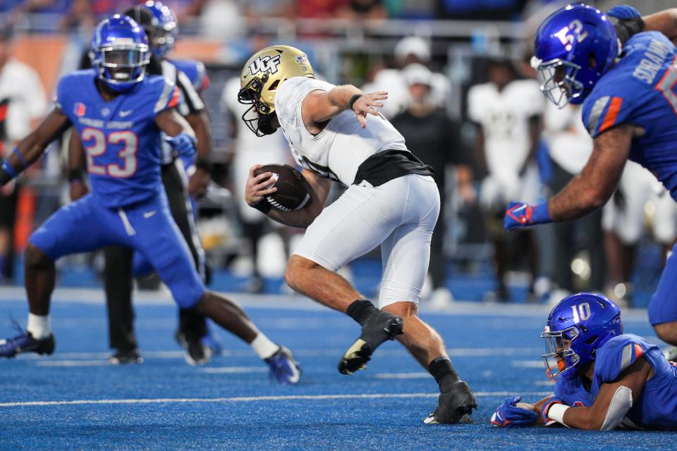 UCF quarterback John Rhys Plumlee (10) was injured late in Saturday's 18-16 win at Boise State.