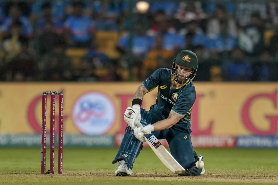 Australia's captain Matthew Wade attempts to play a shot during the fifth T20 cricket match between India and Australia in Bengaluru, India, Sunday, Dec. 3, 2023. (AP Photo/Aijaz Rahi)