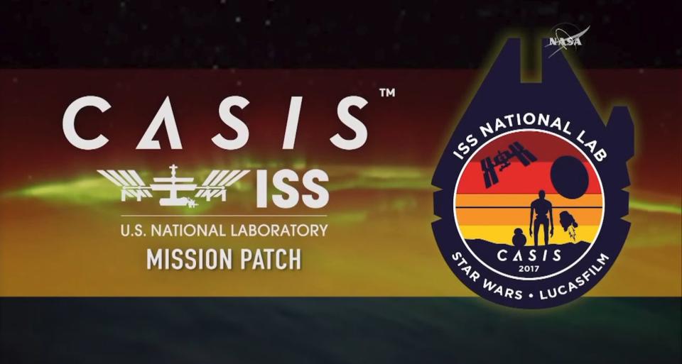 A look at the "Star Wars" CASIS mission patch design honoring the Millennium Falcon, Death Star, the International Space Station and droids from the franchise. <cite>NASA TV</cite>