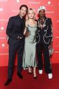 Adrien Brody, Georgia May Jagger and Billy Porter pose together at the Montblanc: Launch Collection to benefit RED on Tuesday in Paris.