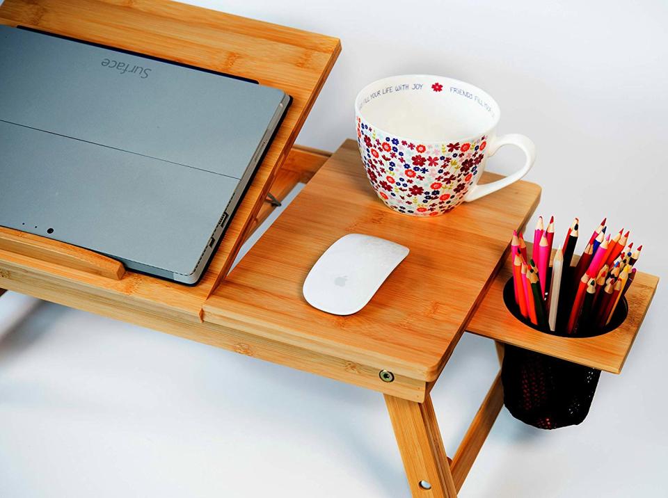 Everything you need is available on this lap desk. (Photo: Amazon)