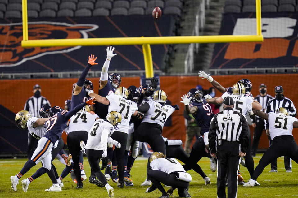 New Orleans Saints kicker Wil Lutz (3) kicks a field during overtime to defeat the Chicago Bears 26-23 in an NFL football game in Chicago, Sunday, Nov. 1, 2020. (AP Photo/Charles Rex Arbogast)