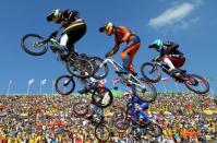 2016 Rio Olympics - Cycling BMX - Final - Women's BMX Final - Olympic BMX Centre - Rio de Janeiro, Brazil - 19/08/2016. Mariana Pajon (COL) of Colombia leads the race. REUTERS/Paul Hanna FOR EDITORIAL USE ONLY. NOT FOR SALE FOR MARKETING OR ADVERTISING CAMPAIGNS. - RTX2M5GU
