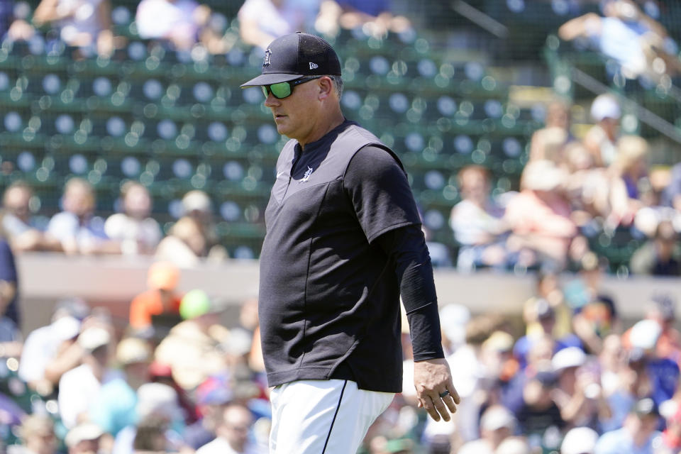 Detroit Tigers manager A.J. Hinch walks back to the dugout after replacing a pitcher in the third inning of a spring training baseball game against the Toronto Blue Jays, Monday, March 21, 2022, in Lakeland, Fla. (AP Photo/John Raoux)