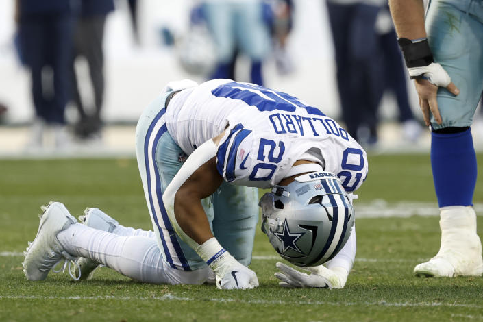 Dallas Cowboys running back Tony Pollard (20) remains on the field after being tackled against the San Francisco 49ers during the first half of an NFL divisional round playoff football game in Santa Clara, Calif., Sunday, Jan. 22, 2023. (AP Photo/Josie Lepe)