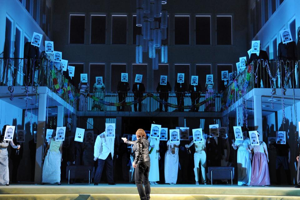 In this June 10, 2013 picture provided by the Frankfurt Opera House, Alfred Kim, as a young Sicilian, back to camera, performs in Frankfurt, Germany during a dress rehearsal for the rarely heard original French version of the Opera 'Les vepres Siciliennes' (The Sicilian vespers) by Giuseppe Verdi which had its premiere on June 16, 2013 at the Opera in Frankfurt, Germany. (AP Photo/Thilo Beu, Oper Frankfurt) MANDATORY CREDIT