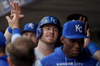 Kansas City Royals' Ryan O'Hearn is congratulated after scoring against the Minnesota Twins during the fourth inning of a baseball game Friday, May 27, 2022, in Minneapolis. (AP Photo/Bruce Kluckhohn)