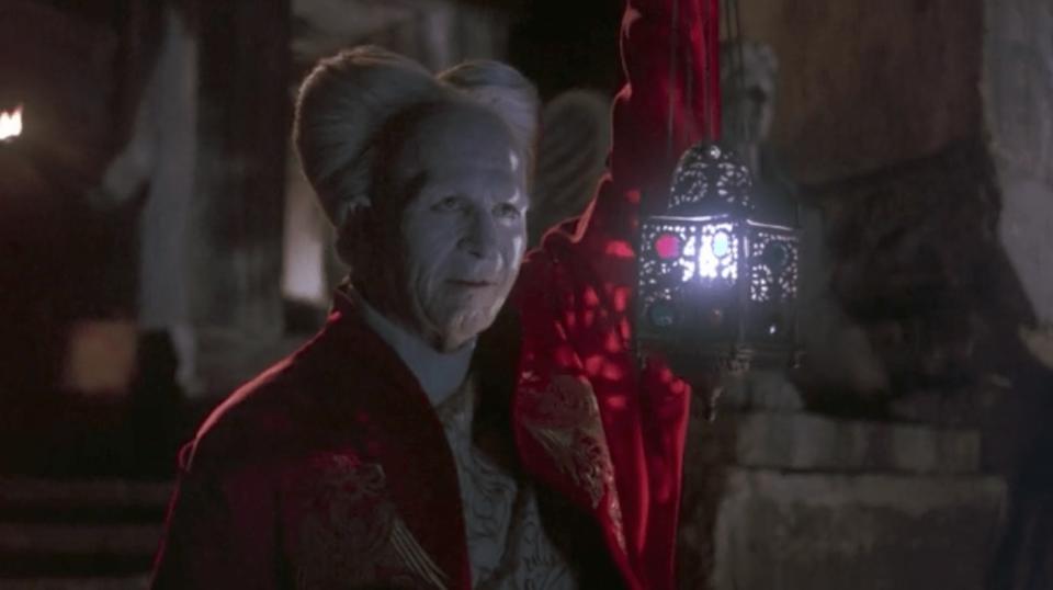 Gary Oldman's Dracula greets Harker with a lantern in his hand in Bram Stoker's Dracula.