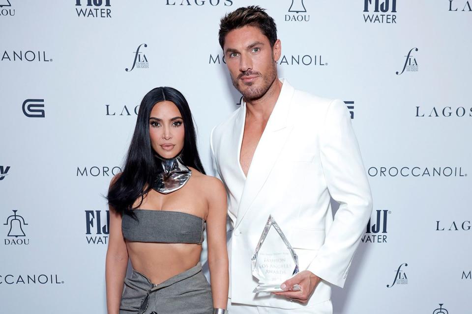 <p>Stefanie Keenan/Getty Images</p> Kim Kardashian and Chris Appleton pictured at The Daily Front Row