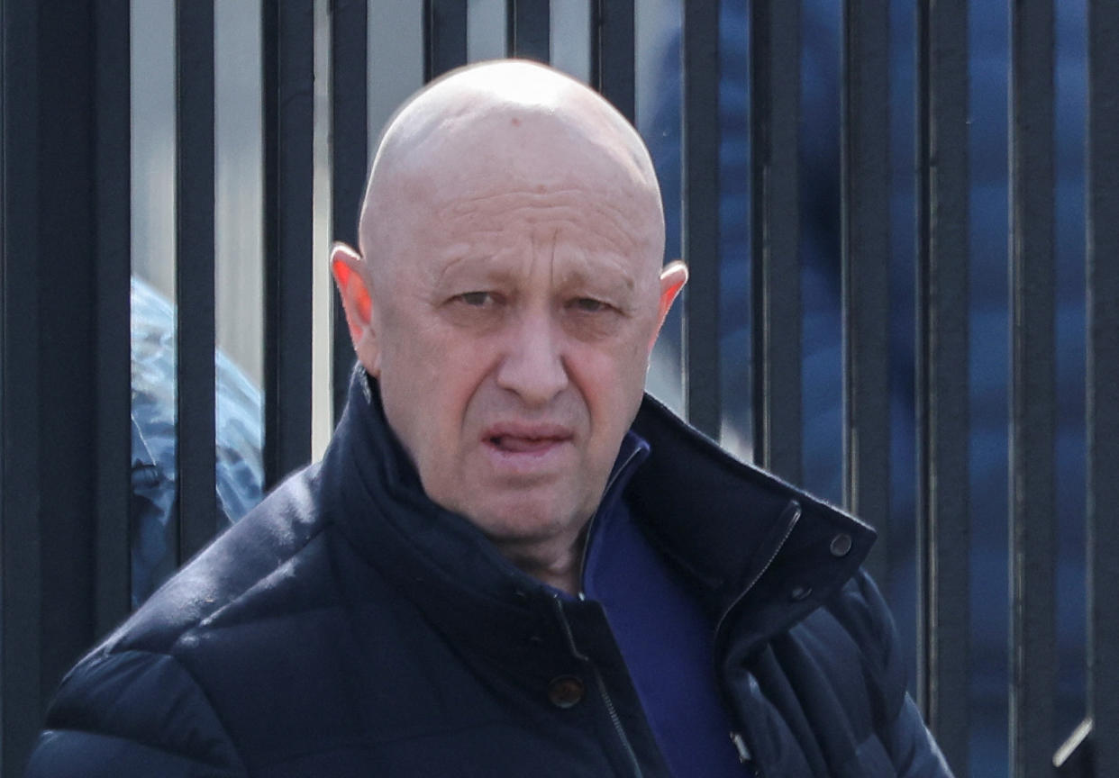 Founder of Wagner private mercenary group Yevgeny Prigozhin leaves a cemetery before the funeral of Russian military blogger Maxim Fomin widely known by the name of Vladlen Tatarsky, who was recently killed in a bomb attack in a St Petersburg cafe, in Moscow, Russia, April 8, 2023. REUTERS/Yulia Morozova