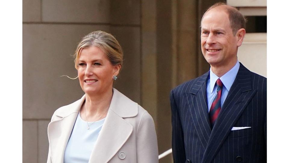 Britain's Prince Edward, Duke of Edinburgh and Britain's Sophie, Duchess of Edinburgh react as members of France's Gendarmerie Garde Republicaine take part in a special Changing of the Guard ceremony 