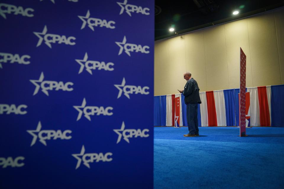 CPAC attendees await the start of the first day of the Conservative Political Action Conference, CPAC 2024, at the Gaylord National Resort & Convention Center.