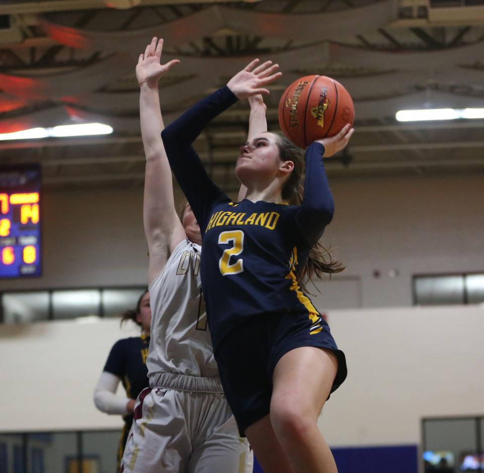 Highland's Grace Koehler goes for a layup against O'Neill's Daisy West during the Section 9 Class B girls basketball championship on February 29, 2024.