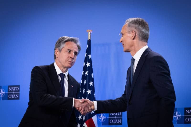 US Secretary of State Antony Blinken (L) shakes hands with NATO Secretary General Jens Stoltenberg during a meeting on the sidelines of the NATO foreign ministers meeting in Brussels. Europe and the United States need one another for their own security, Stoltenberg said in a speech to mark the alliance's 75th anniversary on 04 April. -/NATO/dpa