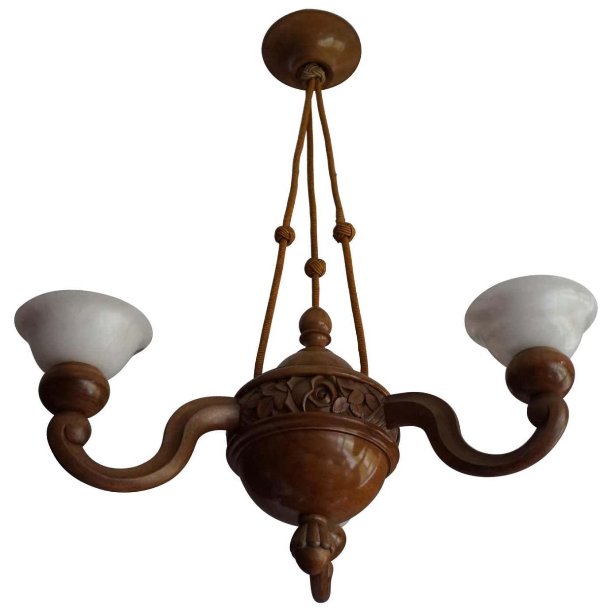 <p><a href="https://go.redirectingat.com?id=74968X1596630&url=https%3A%2F%2Fwww.1stdibs.com%2Ffurniture%2Flighting%2Fchandeliers-pendant-lights%2Fstunning-hand-carved-nutwood-alabaster-art-deco-pendant-light-chandelier%2Fid-f_16252071%2F&sref=https%3A%2F%2F" rel="nofollow noopener" target="_blank" data-ylk="slk:Shop Now;elm:context_link;itc:0;sec:content-canvas" class="link rapid-noclick-resp">Shop Now</a></p><p>Nutwood and Alabaster Chandelier</p><p>1stdibs.com</p><p>$1783.05</p>