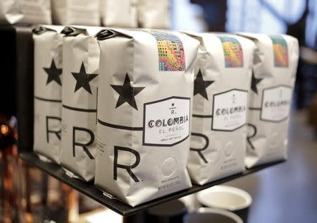 Bags of Starbucks small-lot coffee featuring the new "reserve" logo is on display at a preview of its new Reserve Roastery and Tasting Room in Seattle, Washington December 4, 2014. REUTERS/Jason Redmond