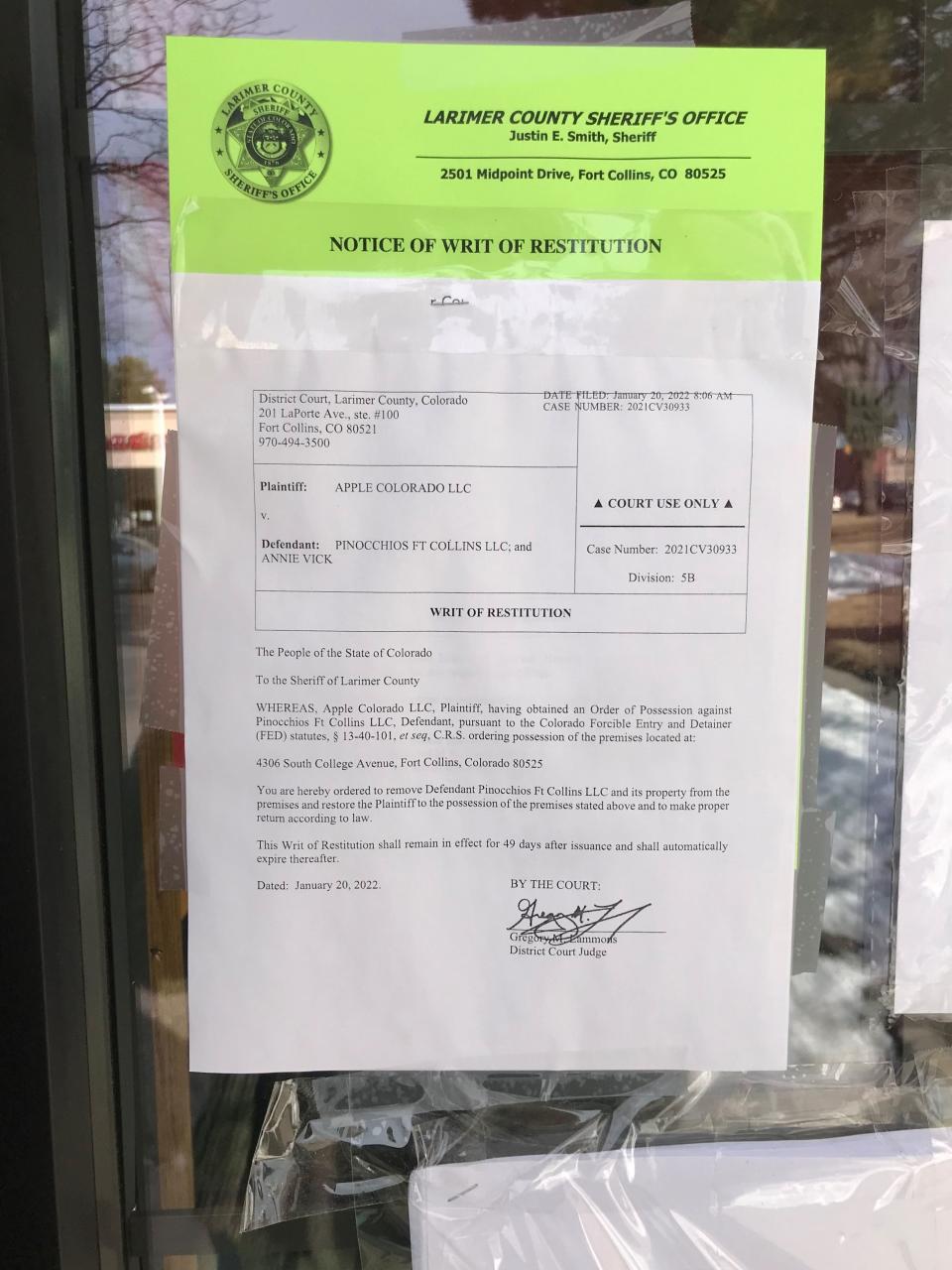 County and court documents were taped in the window of Pinocchios Incredible Italian's Fort Collins location Monday, Jan. 24, 2022. The restaurant, which appeared closed, faces claims that it owes its property's owner more than $182,000 in past due rent.